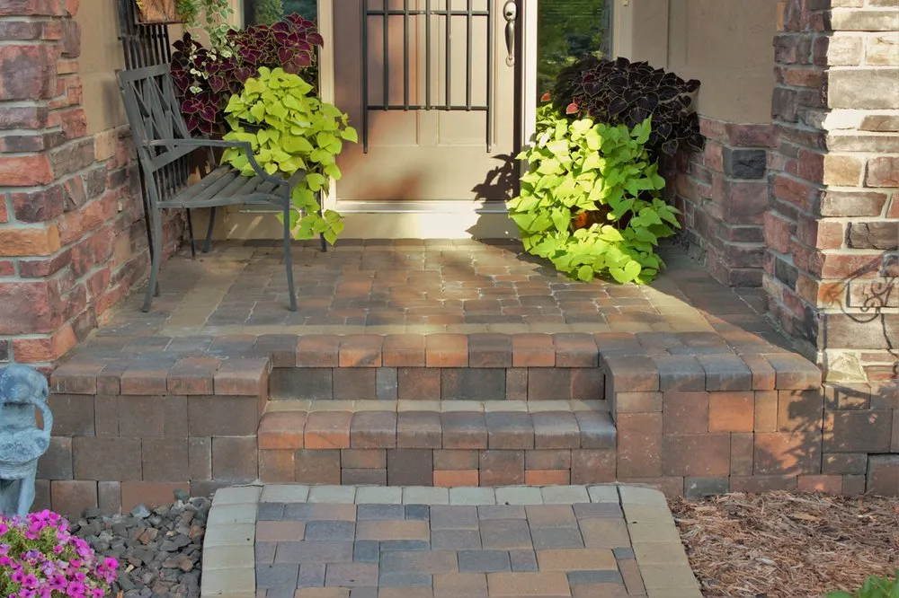 Professional yard maintenance for residential properties across Minneapolis, MN - Custom Construction Services