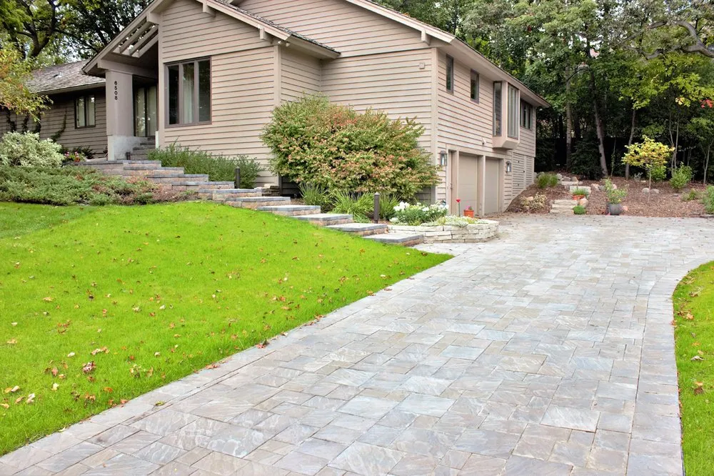 Local yard maintenance for residential properties in Minneapolis, MN by Custom Construction Services