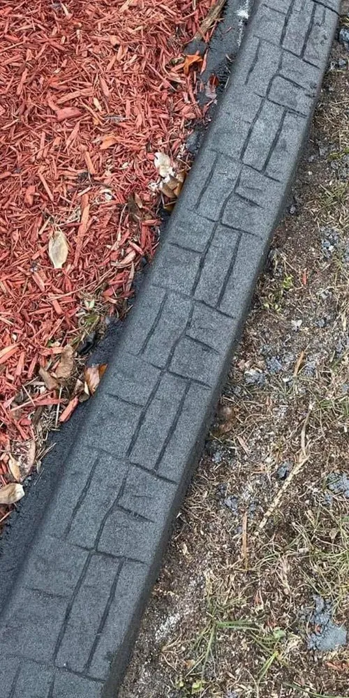 Top-rated lawn mowing service for homes in Dunnellon, FL by Custom Creations Curbing & Landscaping