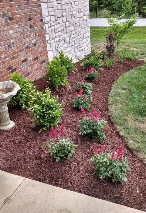 Professional lawn mowing service for outdoor upgrades across Marshfield, MO - Custom Creations Landscaping & Lawn