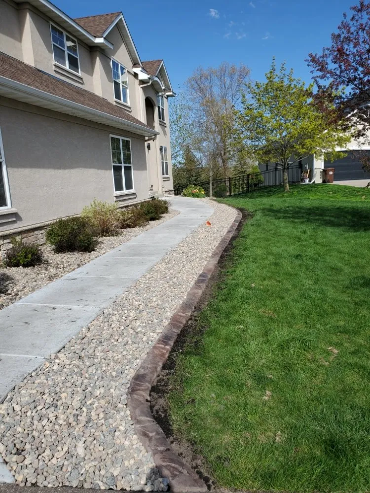 Local yard cleanup service for residential properties in Rosemount, MN by Custom Curb Appeal