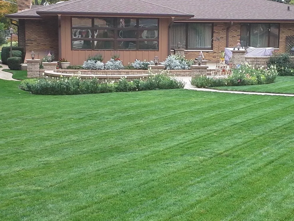 Professional landscape installation for homes in Elgin, IL by Custom Dreams Landscape And Brick