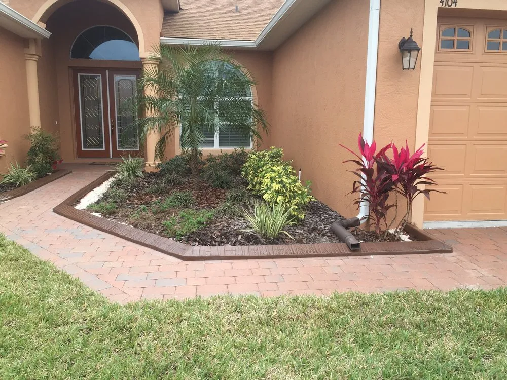 Reliable lawn care service for homes in Haines City, FL by Custom Edge Landscape Curbing