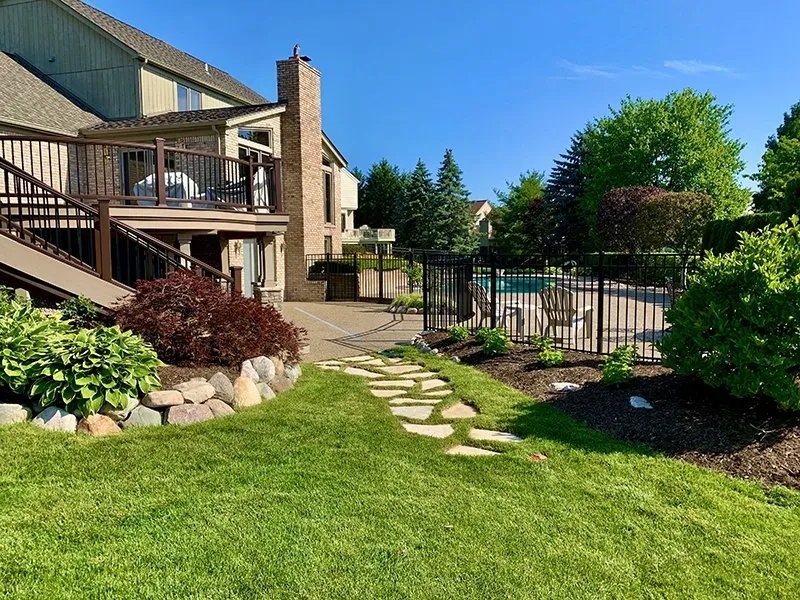 Expert lawn mowing service for beautiful yards in Livonia, MI by Custom Environments Landscape and Design