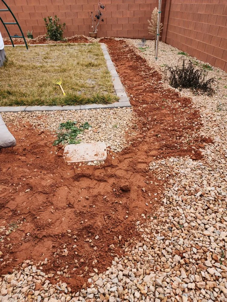 Professional yard cleanup service for residential properties in Saint George, UT by Custom Escapes