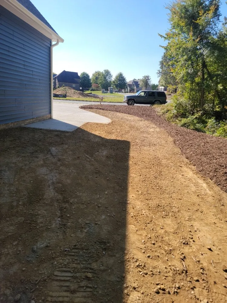 Professional lawn mowing service for beautiful yards in Trinity, NC by Custom Hardscapes and Grading