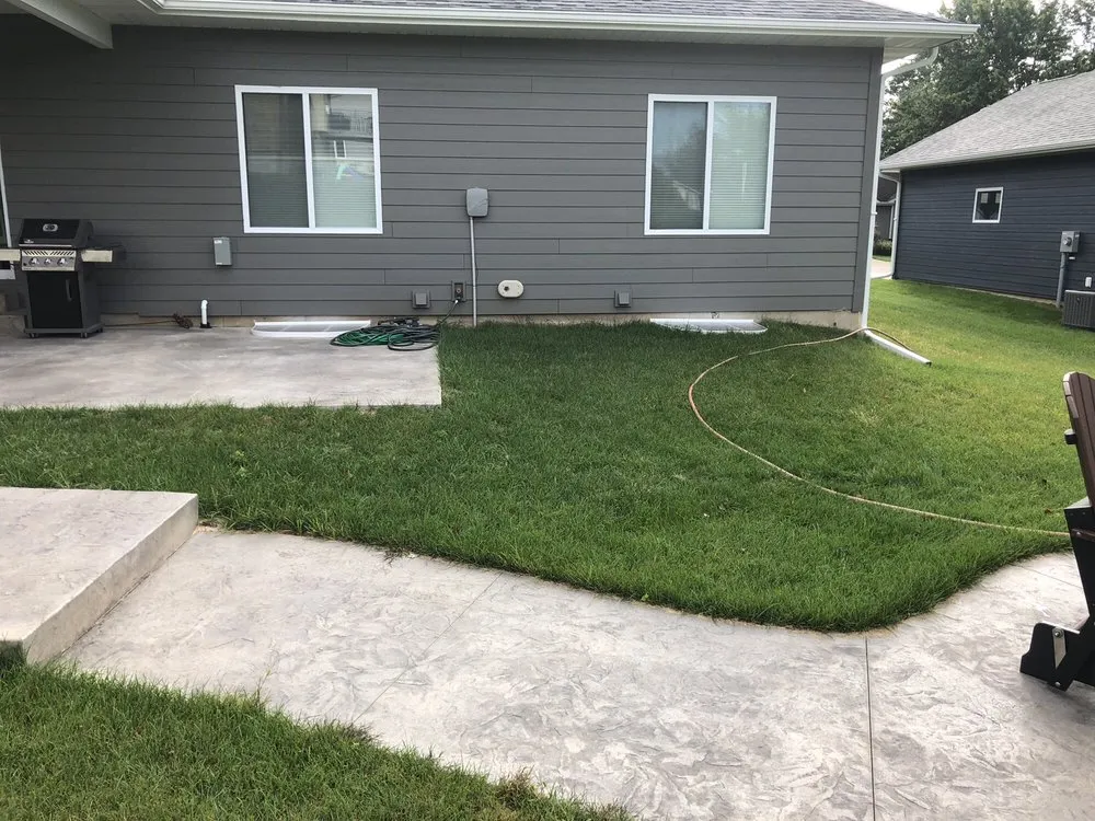 Top-rated landscape installation with custom design in North Liberty, IA by Custom Landscapes