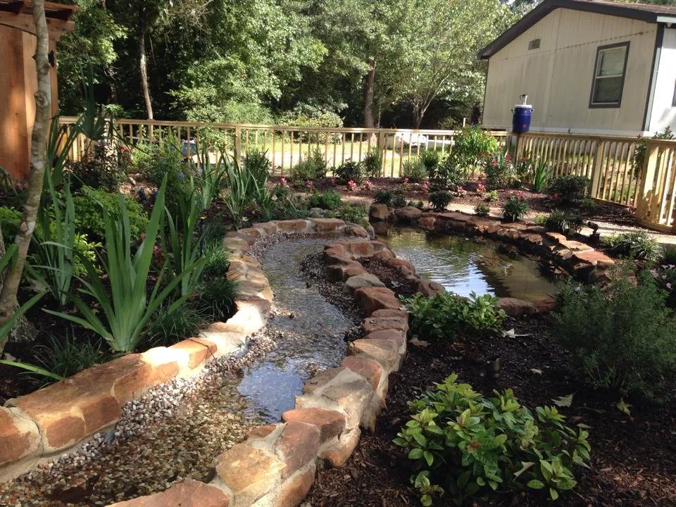 Reliable lawn mowing service for outdoor upgrades across Porter, TX - Custom Landscaping & Design - Patios Unlimited