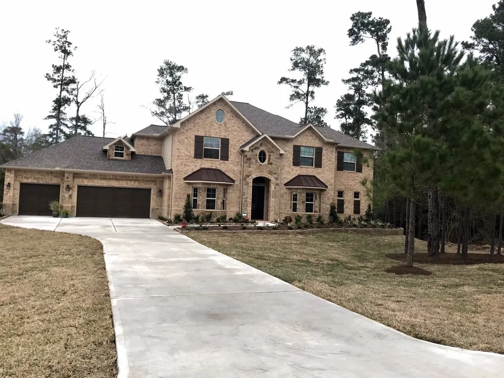 Affordable lawn care service in Porter, TX by Custom Landscaping & Design - Patios Unlimited