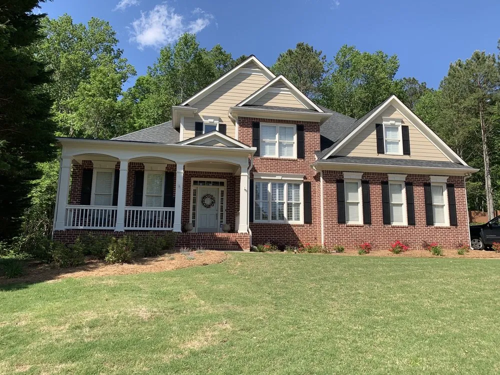 Professional lawn mowing service for year-round maintenance in Snellville, GA by Custom Lawn Care