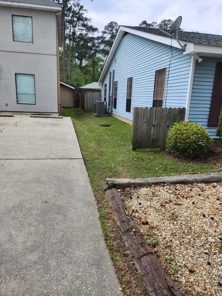 Reliable outdoor landscaping for beautiful yards in Mandeville, LA by Custom Lawncare ByJohn