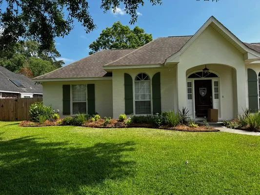 Custom Lawncare ByJohn Logo