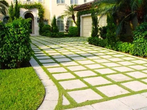 Professional lawn mowing service for year-round maintenance in Naples, FL by Custom Outdoor Creations of SWFL