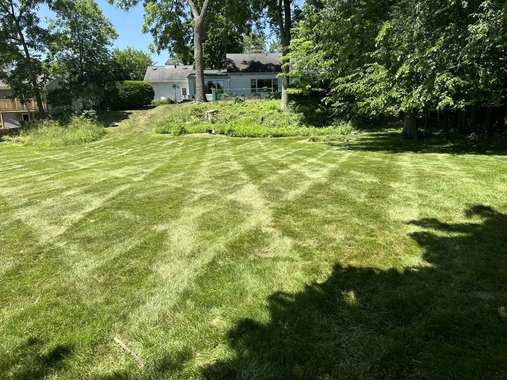 Expert landscape installation for year-round maintenance in Burton, MI by Custom Outdoor services