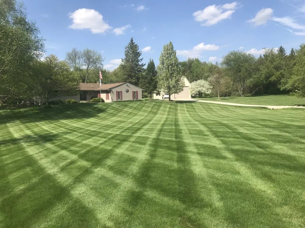 Reliable yard maintenance for beautiful yards across Burton, MI - Custom Outdoor services