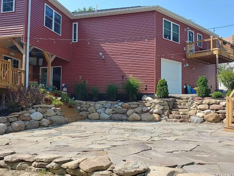 Reliable lawn mowing service for residential properties in Hamburg, NY by Custom Outdoor Solutions