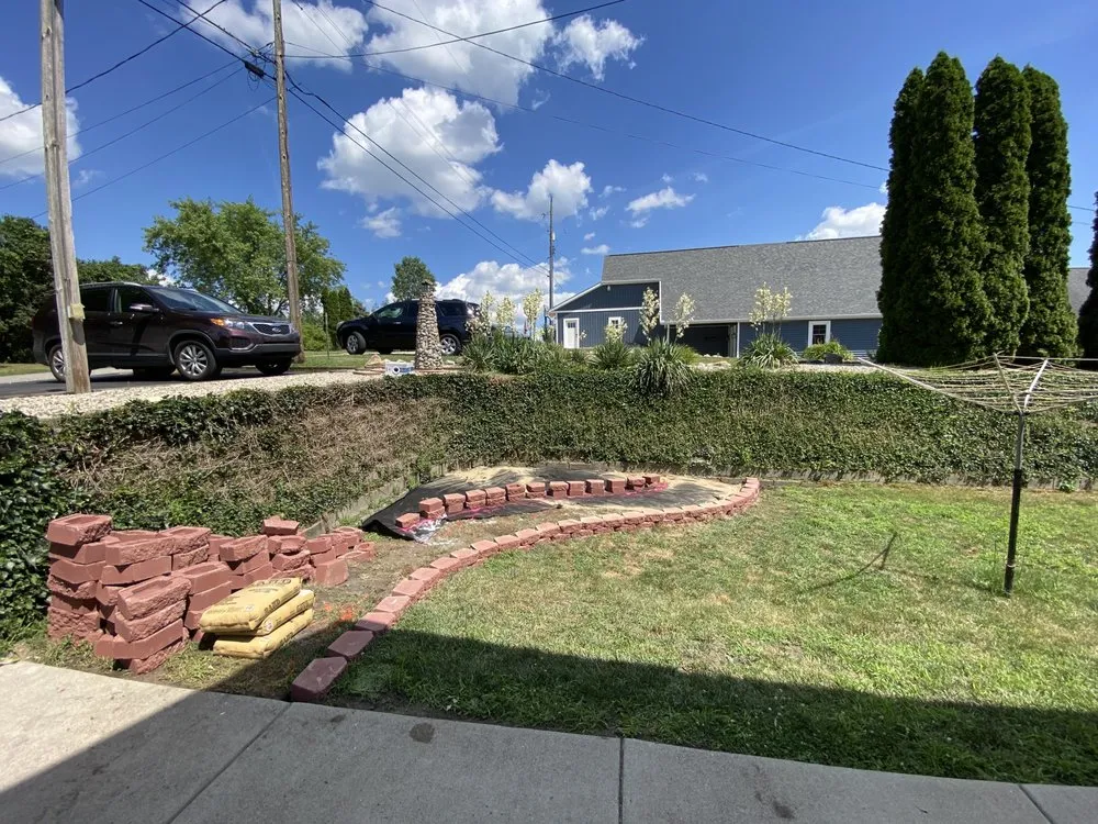 Custom landscaping services for year-round maintenance in Clayton, MI by Custom Outdoors