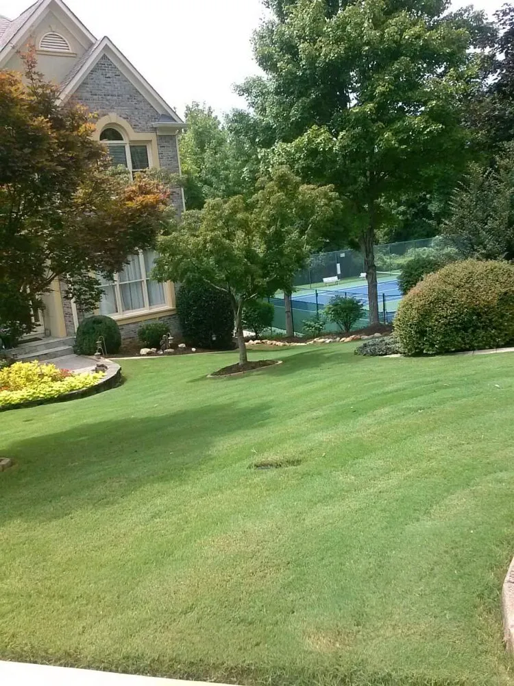 Expert outdoor landscaping in Austell, GA - Cut, Edge, & Blow