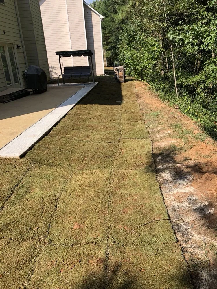 Custom garden landscaping for residential properties in Austell, GA by Cut, Edge, & Blow