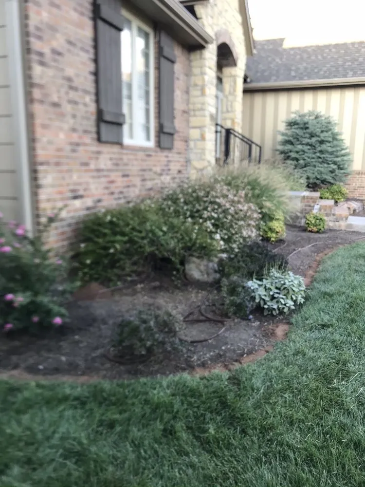 Custom landscape installation in Derby, KS by Cut It My Way Lawn Care