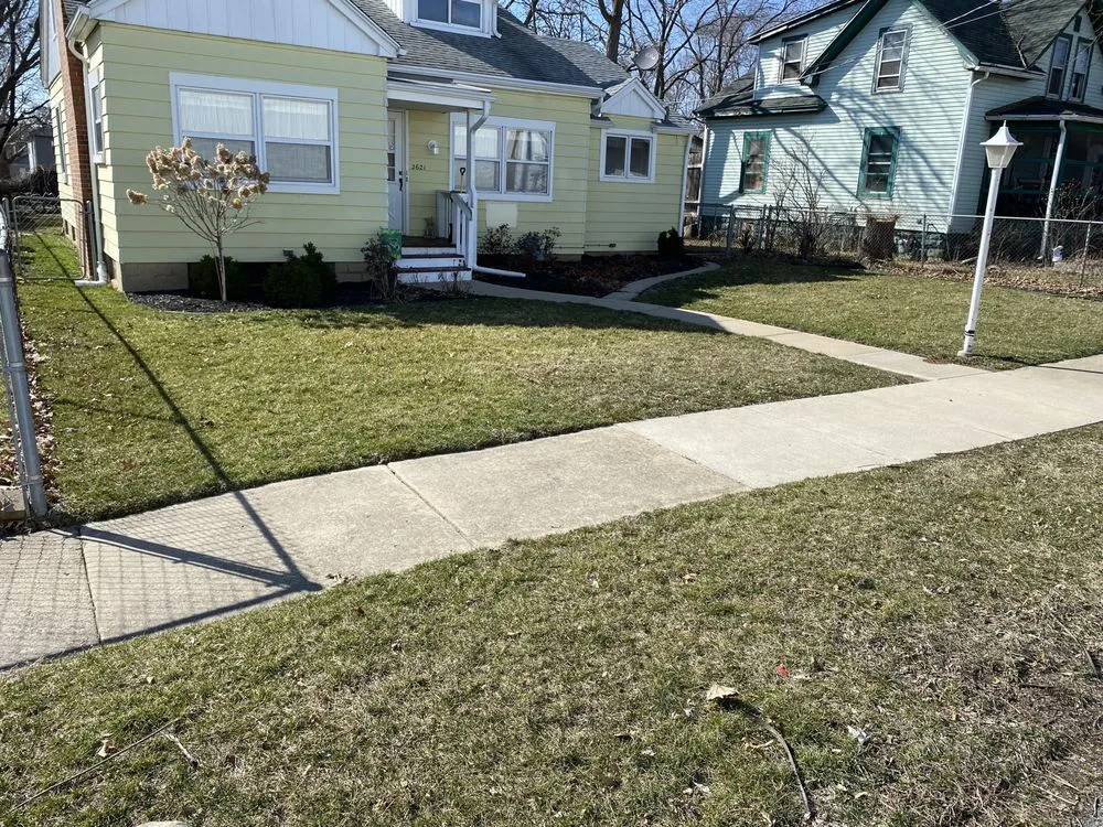 Professional outdoor landscaping for homes in Machesney Park, IL by Cut master mowing service