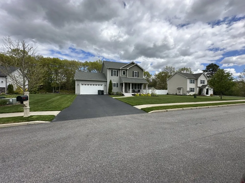 Local lawn mowing service with custom design in Cranston, RI by Cut N Go Landscaping