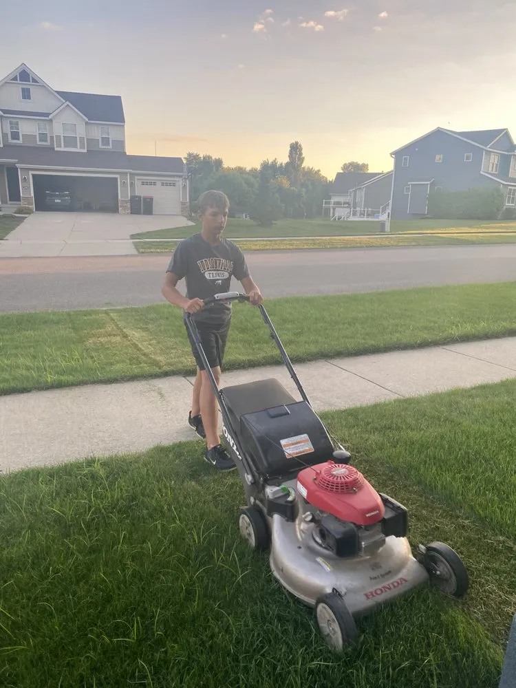 Professional lawn mowing service in Hudsonville, MI by Cut Price Mowing