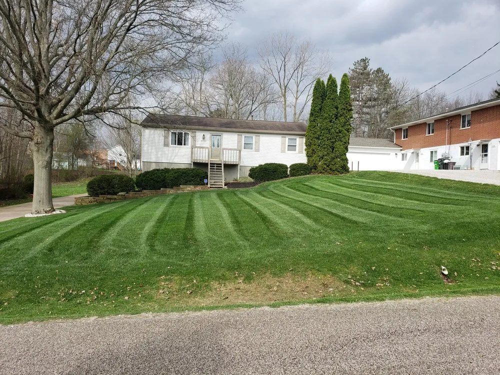 Affordable lawn care service for year-round maintenance in Akron, OH by Cut Right Lawn Care