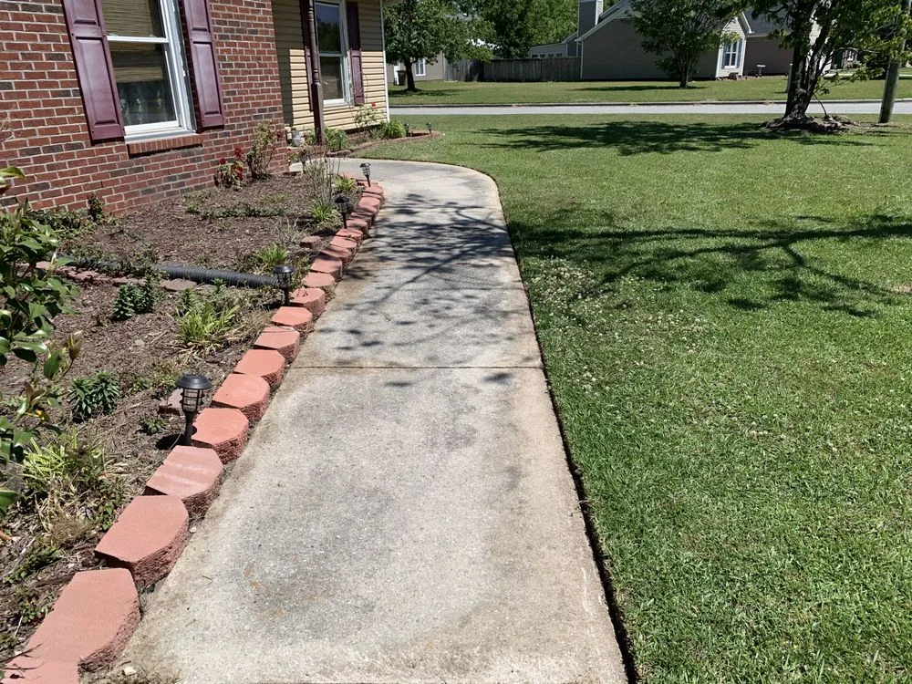 Reliable outdoor landscaping for residential properties across Jacksonville, NC - Cut The World Lawncare