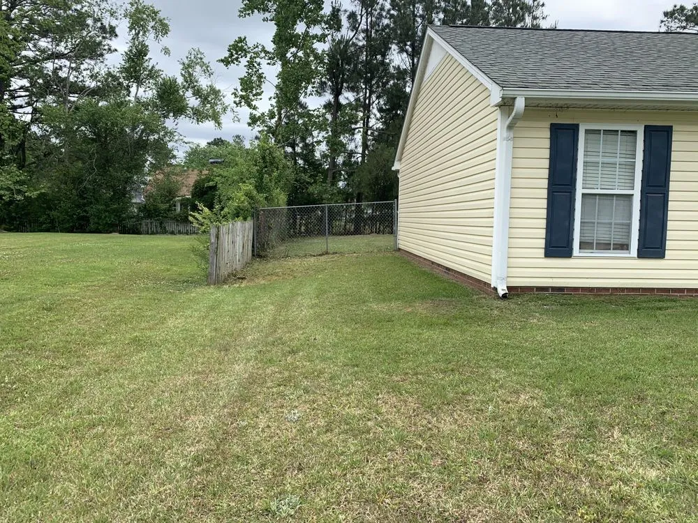 Top-rated yard maintenance for residential properties in Jacksonville, NC by Cut The World Lawncare