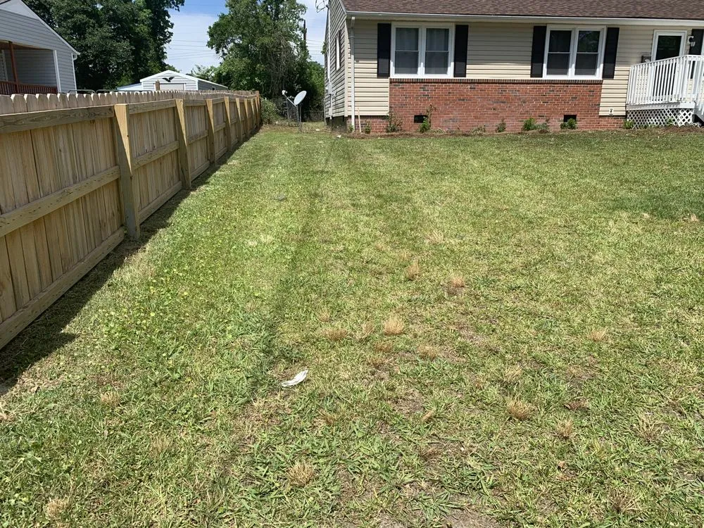 Trusted landscape design with custom design in Jacksonville, NC by Cut The World Lawncare