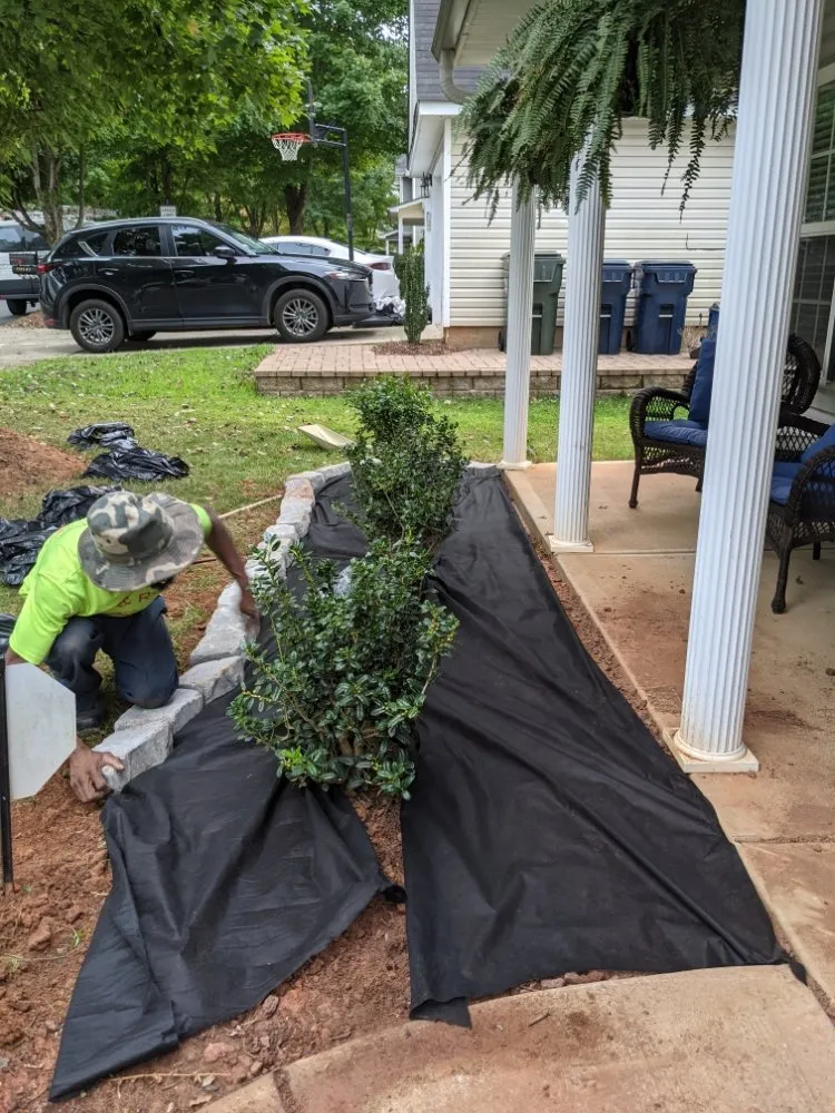 Custom landscape design for year-round maintenance in Charlotte, NC by Cutandride Landscaping Lawn Service