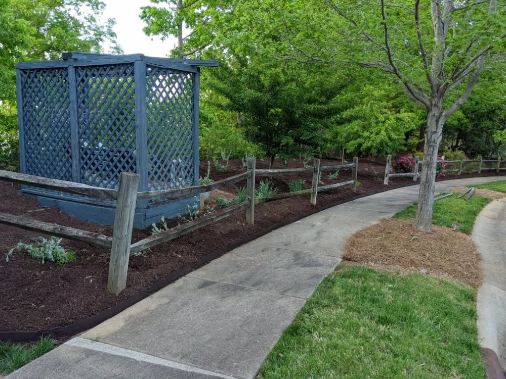 Professional lawn mowing service in Charlotte, NC by Cutandride Landscaping Lawn Service