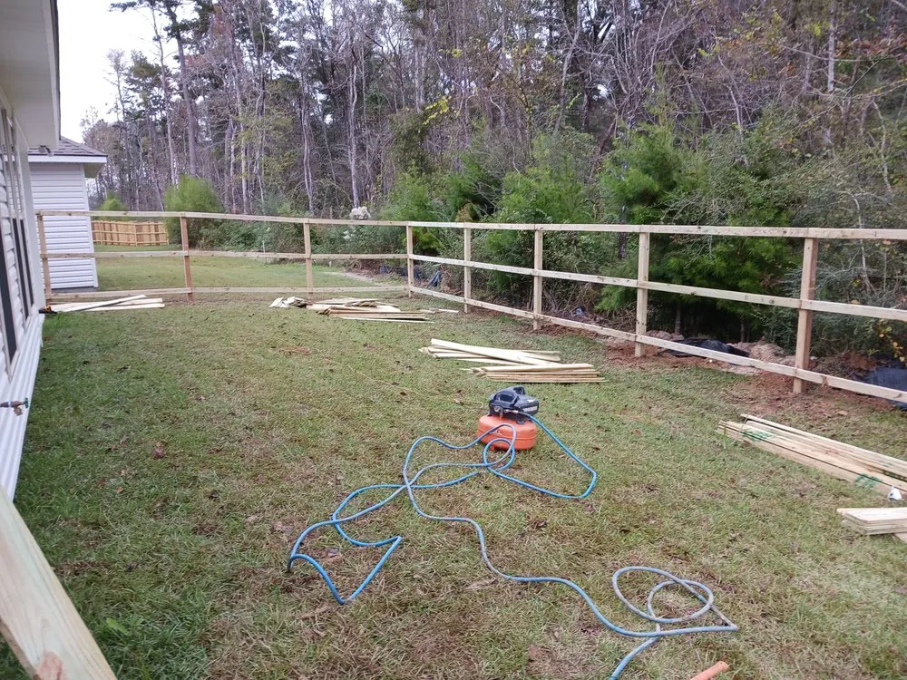 Custom lawn care service near you across Watson, LA - Cute Aza Button Fence and Lawn