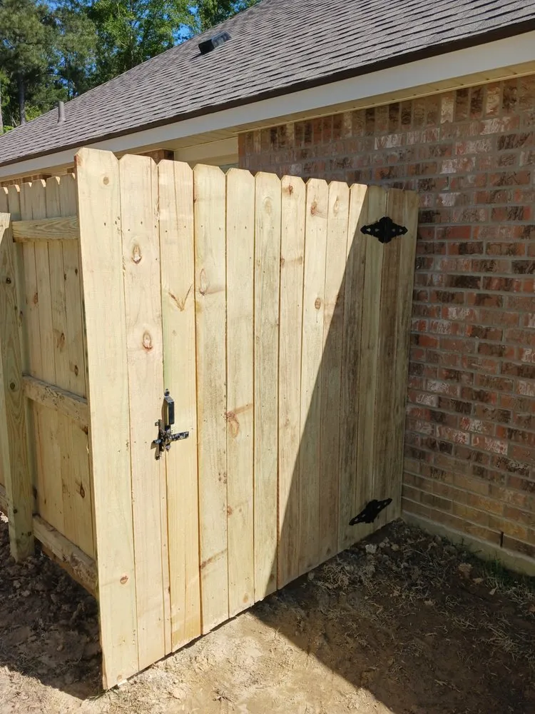 Custom residential landscaping in Watson, LA by Cute Aza Button Fence and Lawn