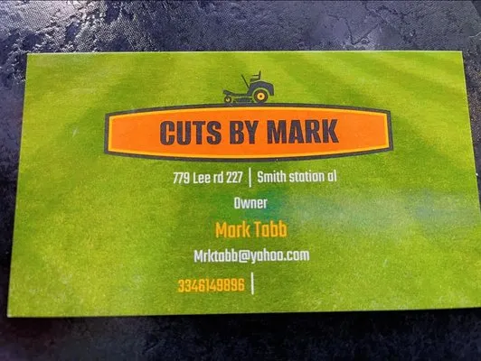 Cuts By Mark Logo