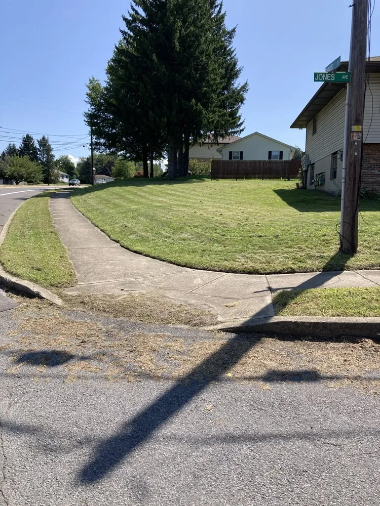 Professional lawn mowing service for outdoor upgrades in Scranton, PA by Cutter's