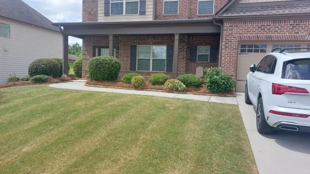 Custom landscape installation for year-round maintenance across Lawrenceville, GA - Cuttin Up Lawncare & Development