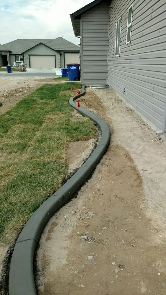 Trusted lawn care service with custom design in Rupert, ID by Cutting Edge Curbing
