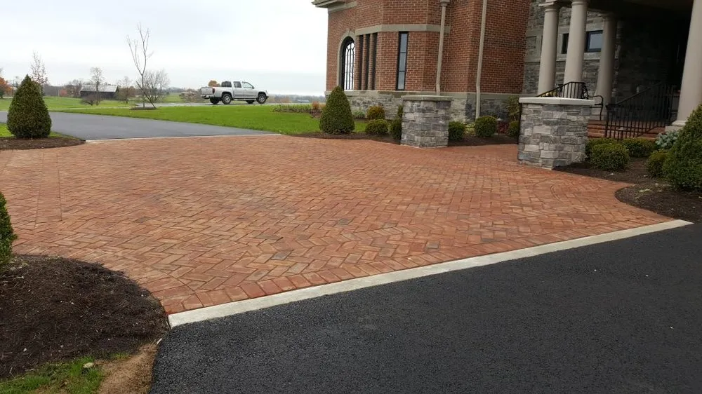 Expert lawn mowing service for year-round maintenance in Nicholasville, KY by Cutting Edge Landscapes