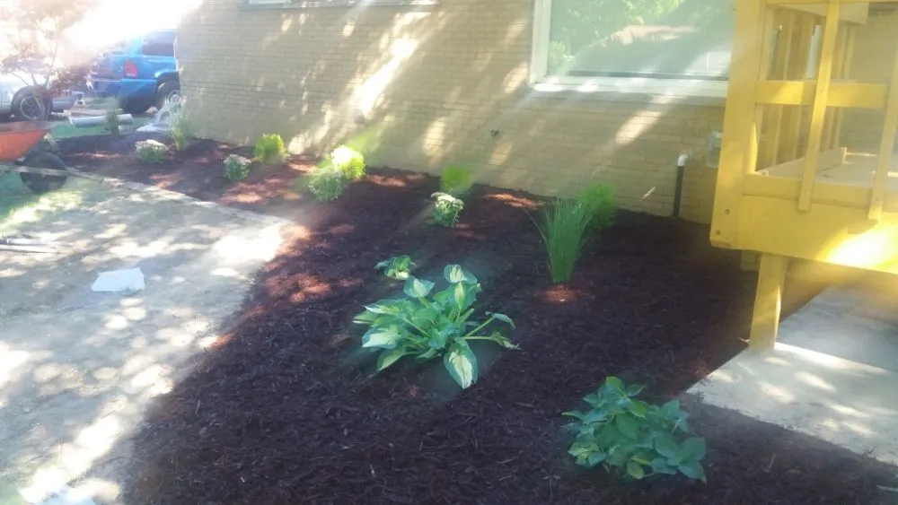 Custom residential landscaping with custom design across Lansing, MI - Cutting Edge Lawn Care