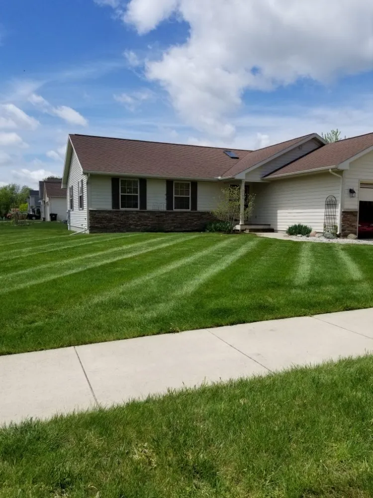Expert garden landscaping for homes in Lansing, MI by Cutting Edge Lawn Care