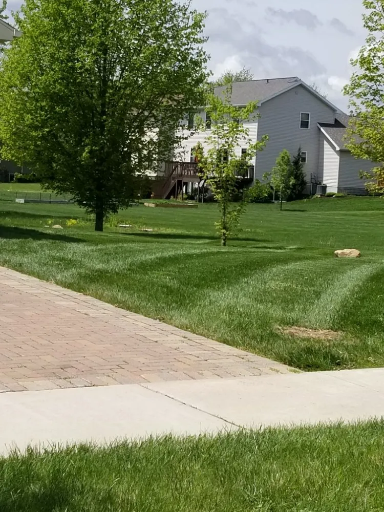 Custom outdoor landscaping in Lansing, MI by Cutting Edge Lawn Care