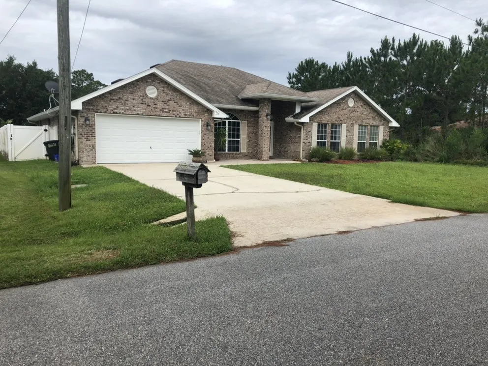 Affordable lawn care service in Palm Coast, FL by Cutting Edge Lawncare & More