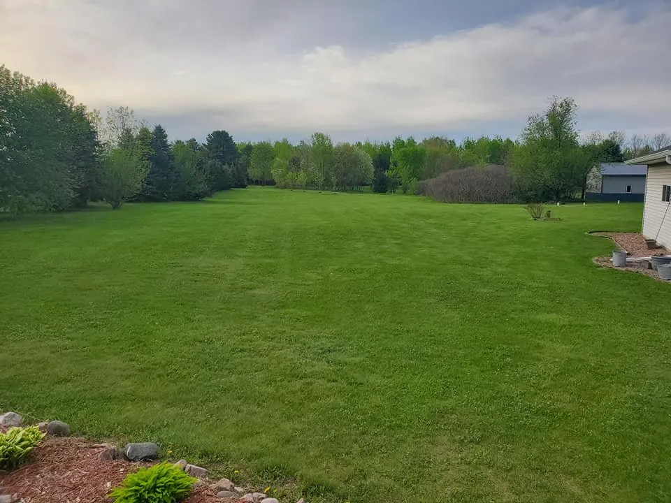 Affordable yard maintenance for residential properties in Cameron, WI by Cutting Edge Lawn's