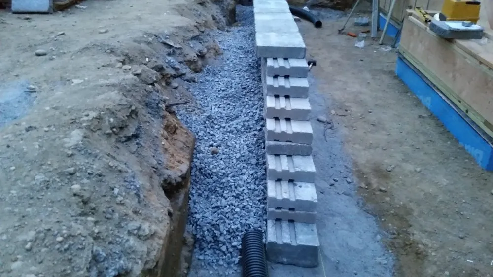 Custom residential landscaping for year-round maintenance in Huntington, NY by Cutting Edge Tree and Landscaping