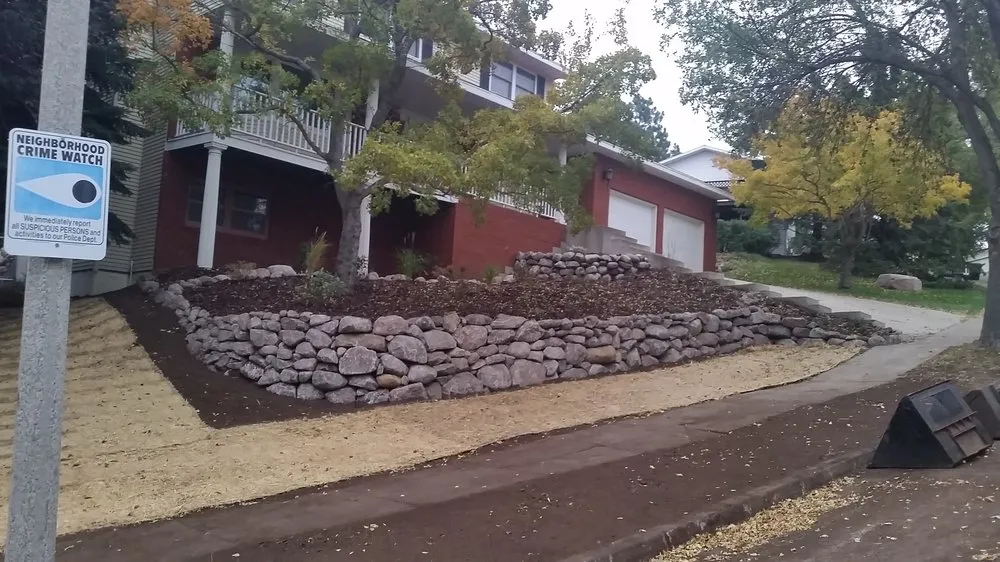 Reliable lawn mowing service for homes across Bismarck, ND - Cutting Edge Yard Art