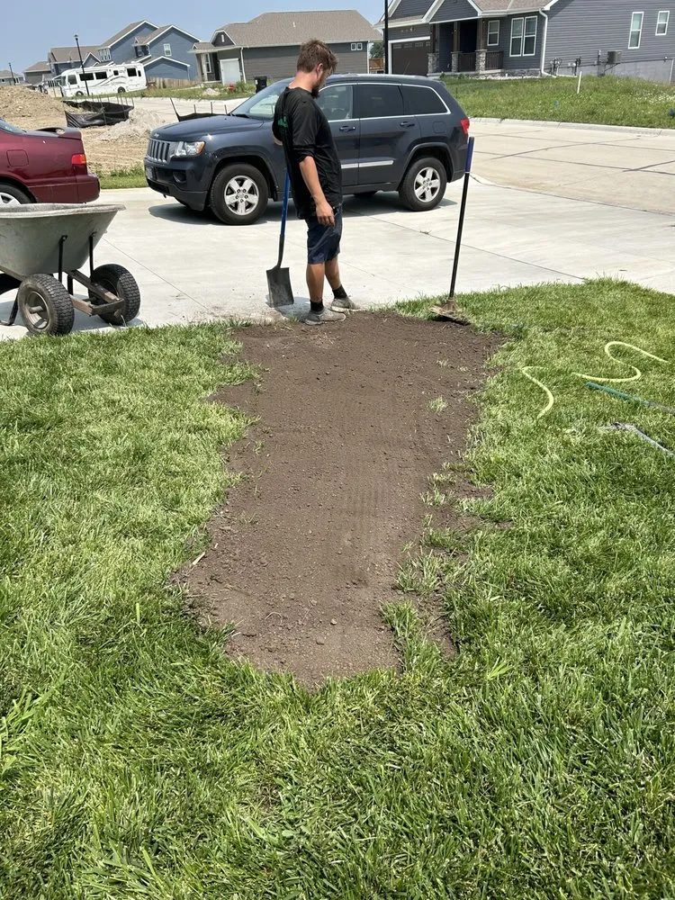 Custom outdoor landscaping with custom design in Rising City, NE by CW Lawn & Landscapes