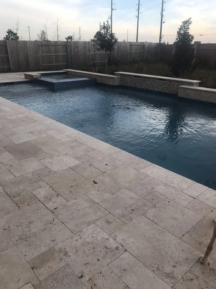 Custom landscape installation in Tomball, TX by Cypress Custom Pools
