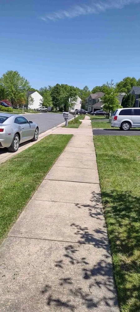 Reliable lawn mowing service for residential properties in Dundalk, MD by Cypress Lawn & Landscape